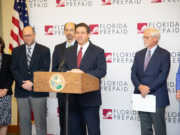 Board Members Adria D. Starkey, Chris Kinsley, Executive Director Kevin Thompson, Governor Ron DeSantis, Board Chairman John D. Rood and Chancellor Kathy Hebda